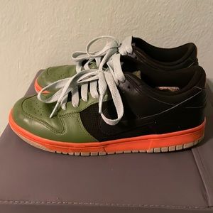 Nike Green and Black Sneakers with Orange Accents